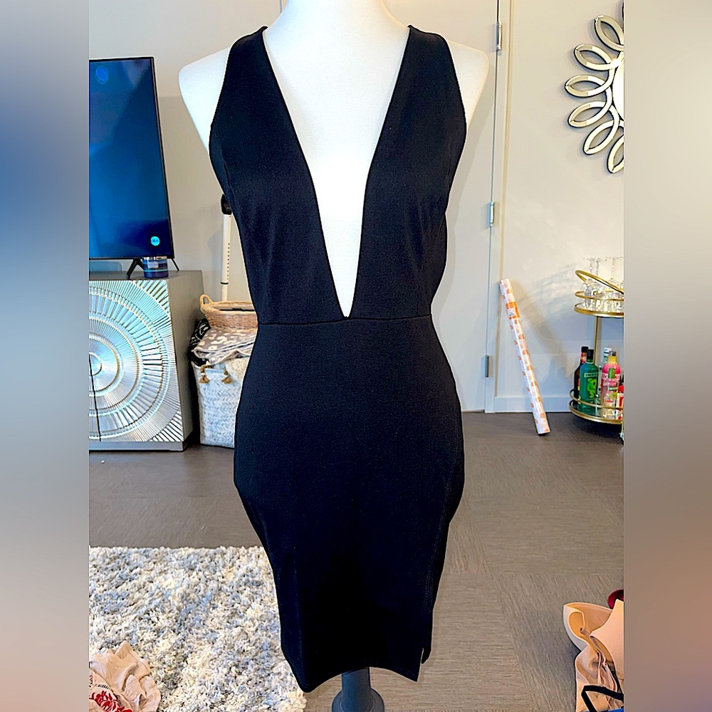 BRAND NEW Black cocktail dress low v neck and open back women’s M
